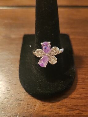 Silver Floral Ring with Purple Gemstones And Cubic Ziconia Accents